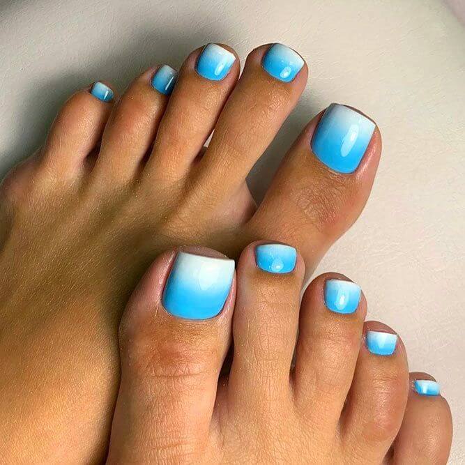 nail art on feet with blue ombre